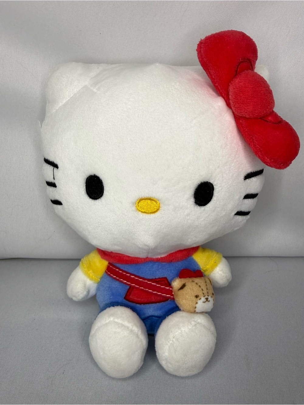 Sanrio Hello Kitty Plush with Red Bow and Colorful Outfit